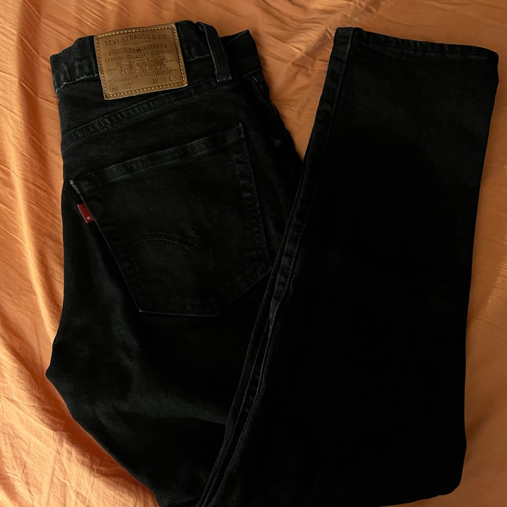 Levi’s 502 black washed denim